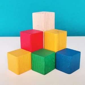Image of colorful wooden blocks orderly stacked on top of each other